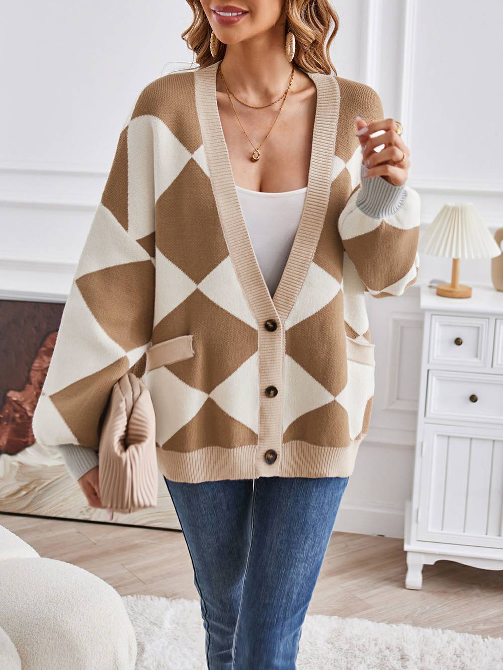 Gebreid vest met geometrische kleurenblokken en V-hals