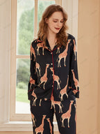 Zwarte pyjamaset met lange mouwen van ijszijde met giraffeprint