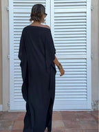 Vloeiende asymmetrische caftan met ceintuur